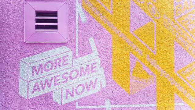Wall mural that reads More Awesome Now